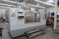 Haas VF-6B/40 CNC Vertical Machining Center with  4th Axis Drive, Probing,  Programmable Coolant Nozzle, Chip Auger, Thru Spindle Coolant