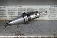 Haas VF-6B/40 CNC Vertical Machining Center with  4th Axis Drive, Probing,  Programmable Coolant Nozzle, Chip Auger, Thru Spindle Coolant