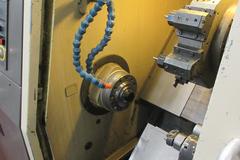 Hardinge Conquest T-42 CNC 3-Axis 2-Turret Turning Center with Har-Matic Bar Feeder Fanuc Series 18-T Control, Chip Conveyor and More