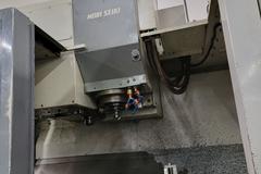Mori Seiki MV-40 CNC 3-Axis Vertical Machining Center with 20 Station Twin Arm Tool Changer, CT-40 8000 RPM Spindle, Coolant System, Mist Buster