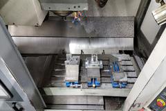 Mori Seiki MV-40 CNC 3-Axis Vertical Machining Center with 20 Station Twin Arm Tool Changer, CT-40 8000 RPM Spindle, Coolant System, Mist Buster
