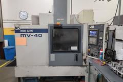 Mori Seiki MV-40 CNC 3-Axis Vertical Machining Center with 20 Station Twin Arm Tool Changer, CT-40 8000 RPM Spindle, Coolant System, Mist Buster