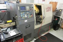 Hardinge Conquest T-42 CNC 3-Axis 2-Turret Turning Center with Har-Matic Bar Feeder Fanuc Series 18-T Control, Chip Conveyor and More