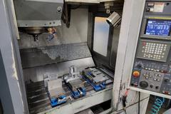 Mori Seiki MV-40 CNC 3-Axis Vertical Machining Center with 20 Station Twin Arm Tool Changer, CT-40 8000 RPM Spindle, Coolant System, Mist Buster