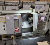 Haas SL-20 CNC Turning Center with Tool Presetter, Auto Door, 12-Station Turret, LMC 3-Jaw 8" Chuck, and Chip Conveyor