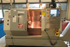 Haas SL-20 CNC Turning Center with Tool Presetter, Chuck, Chip Conveyor and Tooling