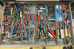 HUGE LOT OF PERISHABLE TOOLING WITH CABINET.  Separated, Labeled & On Pallet.  End Mills, Reamers, Drills, Radius Cutters, Inserts, Carbide and MUCH MORE.  DON"T MISS THIS!! 
