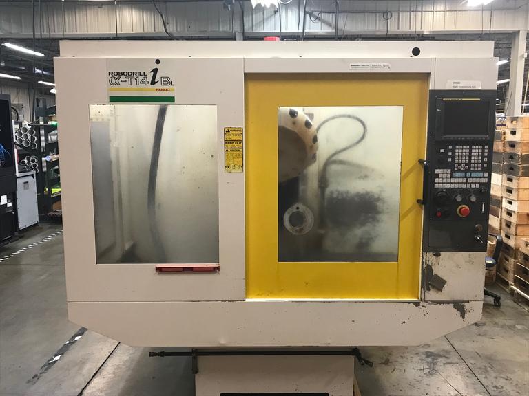 Fanuc Robodrill α-T14iB CNC Vertical Machining Center with Fanuc 16i-M Control, 8000 RPM BT-30 Taper Spindle, 14 Station Tool Changer, and Chip Conveyor