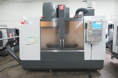 Haas VM-3 CNC Vertical Machining Center with 12,000 RPM CT-40 Spindle, 40 Station Side Mount Tool Changer, Probing, 1000 PSI TSC, High Speed Machining, Mist Collector,  Chip Auger.