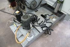 Haas VF-3 CNC Vertical Machining Center with 15,000 RPM CT-40 Spindle, 40 Station Side Mount Tool Changer, Thru-Spindle Coolant, Probing, Macros, High Speed Machining, Mist Collector, and Chip Auger