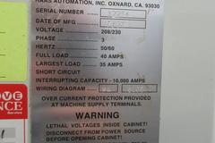 Haas VF-3 CNC Vertical Machining Center with 15,000 RPM CT-40 Spindle, 4th Axis Ready, 40 Station Side Mount Tool Changer,  Probing, Macros, Thru-Spindle Coolant, Mist Collector, and Chip Auger.