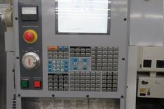 Haas VF-3 CNC Vertical Machining Center with 15,000 RPM CT-40 Spindle, 4th Axis Ready, 40 Station Side Mount Tool Changer,  Probing, Macros, Thru-Spindle Coolant, Mist Collector, and Chip Auger.