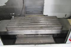 Haas VF-3 CNC Vertical Machining Center with 15,000 RPM CT-40 Spindle, 4th Axis Ready, 40 Station Side Mount Tool Changer,  Probing, Macros, Thru-Spindle Coolant, Mist Collector, and Chip Auger.