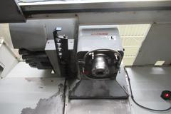 Haas VF-3 CNC Vertical Machining Center with 15,000 RPM CT-40 Spindle, 4th Axis Ready, 40 Station Side Mount Tool Changer,  Probing, Macros, Thru-Spindle Coolant, Mist Collector, and Chip Auger.