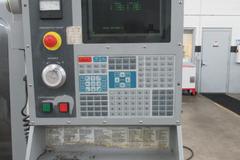 Haas VF-4 CNC Vertical Machining Center, 10K Spindle, 2-Speed Gearbox, 24 Station Twin-Arm ATC, Chip Auger