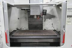 Haas VF-4 CNC Vertical Machining Center, 10K Spindle, 2-Speed Gearbox, 24 Station Twin-Arm ATC, Chip Auger