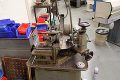 Henri Hauser Model 244 Bench Model Carbide Wheel Grinder With Pedestal Base