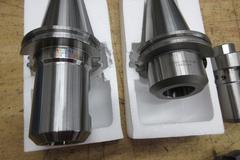 CAT50 Tool Holders (2) 1.5" End Mill Type, (1) 5" Ingersoll Shell Mill, (1) 4" Ingersoll Insert Mill, (1) Erickson Adaptor
