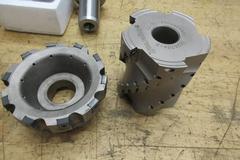 CAT50 Tool Holders (2) 1.5" End Mill Type, (1) 5" Ingersoll Shell Mill, (1) 4" Ingersoll Insert Mill, (1) Erickson Adaptor