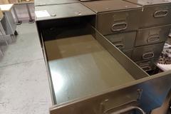 Machines Used | Metal Drawer Units Banded Together, (3) Stacks of (12)
