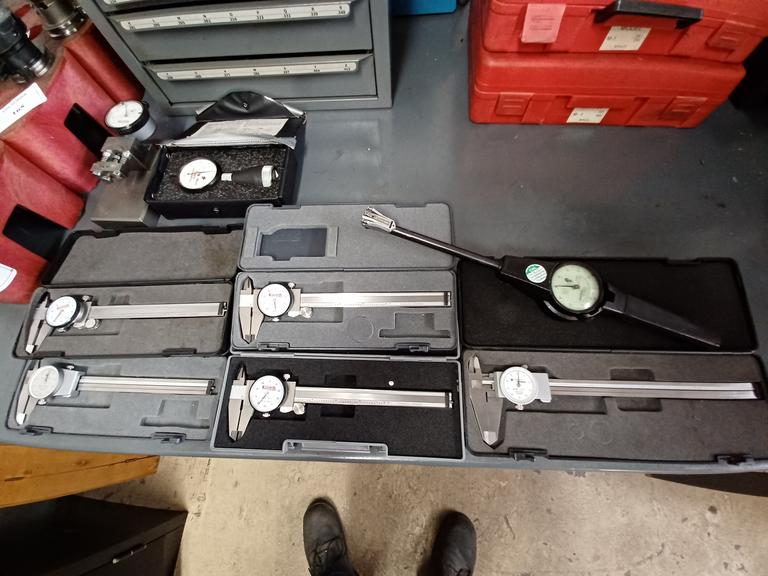 (4) 6" Calipers, Chamfer Gage, (1) 8" Caliper, Dial Indicator, (1) Bore Gage