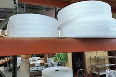 Rolls of Packing Foam and Roll Stand