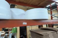 Rolls of Packing Foam and Roll Stand