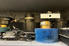 Adjustable Steel Shelving Unit with Contents of Electrical Motors and More