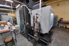 2022 Haas VF-5 CNC Vertical Machining Center with 30,000 RPM Spindle, Side Mount Tool Changer, Programmable Coolant Nozzle, High Speed Machining and More