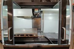 2022 Haas VF-5 CNC Vertical Machining Center with 30,000 RPM Spindle, Side Mount Tool Changer, Programmable Coolant Nozzle, High Speed Machining and More