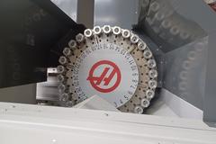2022 Haas VF-5 CNC Vertical Machining Center with 30,000 RPM Spindle, Side Mount Tool Changer, Programmable Coolant Nozzle, High Speed Machining and More