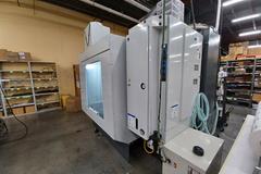 2022 Haas VF-5 CNC Vertical Machining Center with 30,000 RPM Spindle, Side Mount Tool Changer, Programmable Coolant Nozzle, High Speed Machining and More