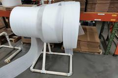 Rolls of Packing Foam and Roll Stand