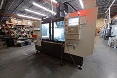 2022 Haas VF-5 CNC Vertical Machining Center with 30,000 RPM Spindle, Side Mount Tool Changer, Programmable Coolant Nozzle, High Speed Machining and More