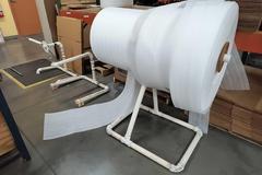 Rolls of Packing Foam and Roll Stand