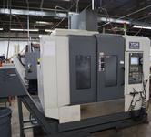 YCM Model NSV102A CNC Vertical Machining Center, 12K Spindle, 30 Station Side Mount ATC, Chip Conveyor