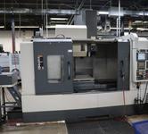 YCM Model NSV156A CNC Vertical Machining Center, Dual Chip Augers, Chip Conveyor
