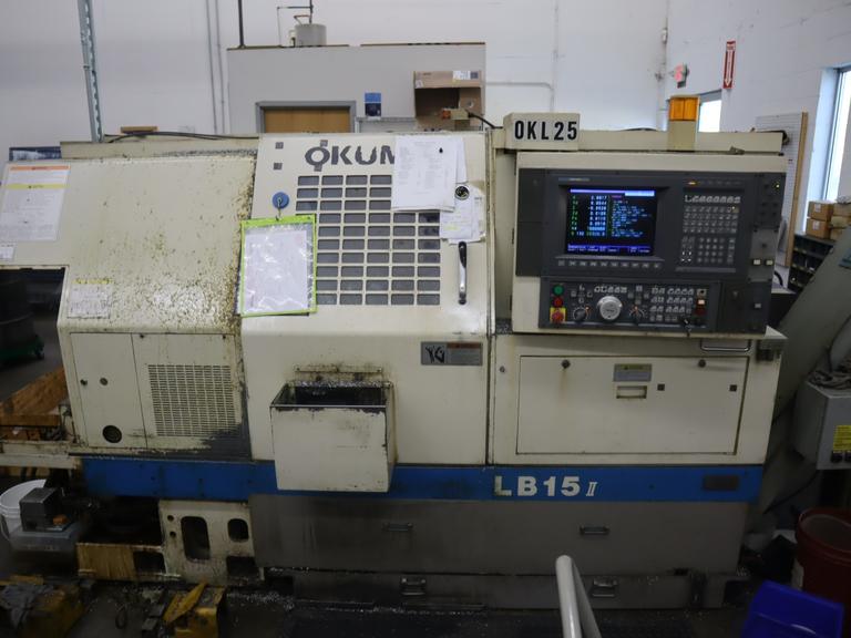 Okuma LB15 II CNC Lathe Turning Center, OSP700L CNC, 12 Station Turret, Tailstock, 8" Chuck, Chip Conveyor