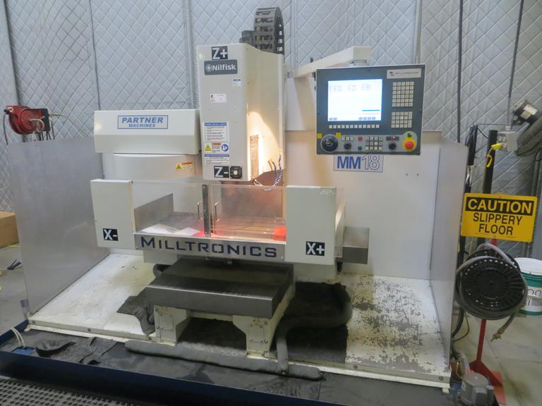 Milltronics Partner MM18 Vertical CNC Machining Center W Milltronics 7200 Control, 16 Station Carousel Tool Changer, Coolant Tank & Pump and MORE!