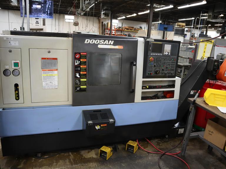 Doosan Lynx 300M CNC Turning Center with Live Milling, 12 Station Turret, 10" 3-Jaw Chuck, Tailstock, Tool Presetter, Parts Catcher, Chip Conveyor