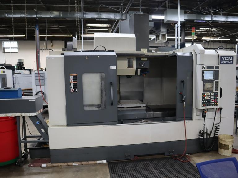 YCM Model NSV156A CNC Vertical Machining Center, Dual Chip Augers, Chip Conveyor