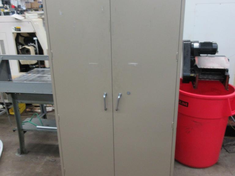 2 Door Metal Storage Cabinet with 6 Adjustable Shelves, with Contents of Lathe Jaws