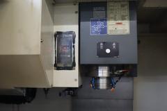 YCM Model NSV102A CNC Vertical Machining Center, 12K Spindle, 30 Station Side Mount ATC, Chip Conveyor