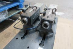Haas HA2TS Twin Spindle Brushless 5C Indexer with Pneumatic Collet Closers and Pneumatic Tailstocks on Subplate.