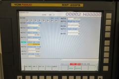 YCM Model NSV102A CNC Vertical Machining Center, 12K Spindle, 30 Station Side Mount ATC, Chip Conveyor