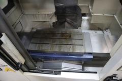 YCM Model XV560A 3-Axis CNC Vertical Machining Center, 10K RPM Spindle, 20 Station Side Mount ATC