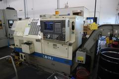 Okuma LB15 II CNC Lathe Turning Center, OSP700L CNC, 12 Station Turret, Tailstock, 8" Chuck, Chip Conveyor