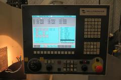 Milltronics Partner MM18 Vertical CNC Machining Center W Milltronics 7200 Control, 16 Station Carousel Tool Changer, Coolant Tank & Pump and MORE!