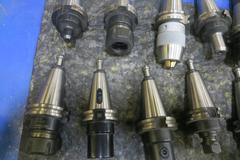 Cat 40 Taper Tool Holders (22) Including ER32, E16 Tool Holders, End Mills, and More