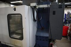YCM Model XV Series 1020A 3-Axis CNC Vertical Machining Center, 10K Spindle, 24 Station SMTC, Chip Auger